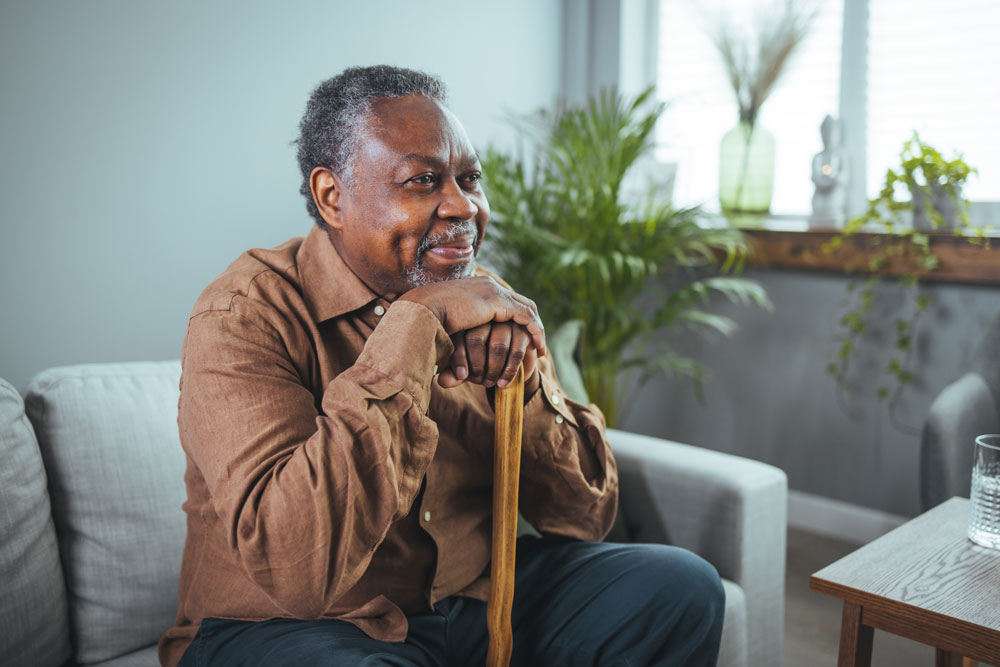 older-adult-reflecting-on-health-and-quality-of-life-at-home