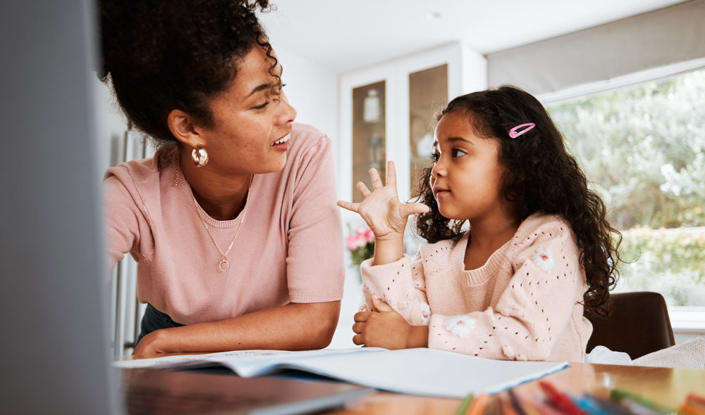 Adult-and-child-engaged-in-conversation-representing-cognitive-emotional-and-developmental-assessment