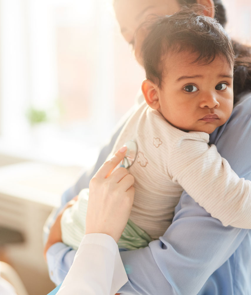 pediatric-healthcare-provider-using-a-stethoscope-to-examine-an-infant-during-a-clinical-appointment
